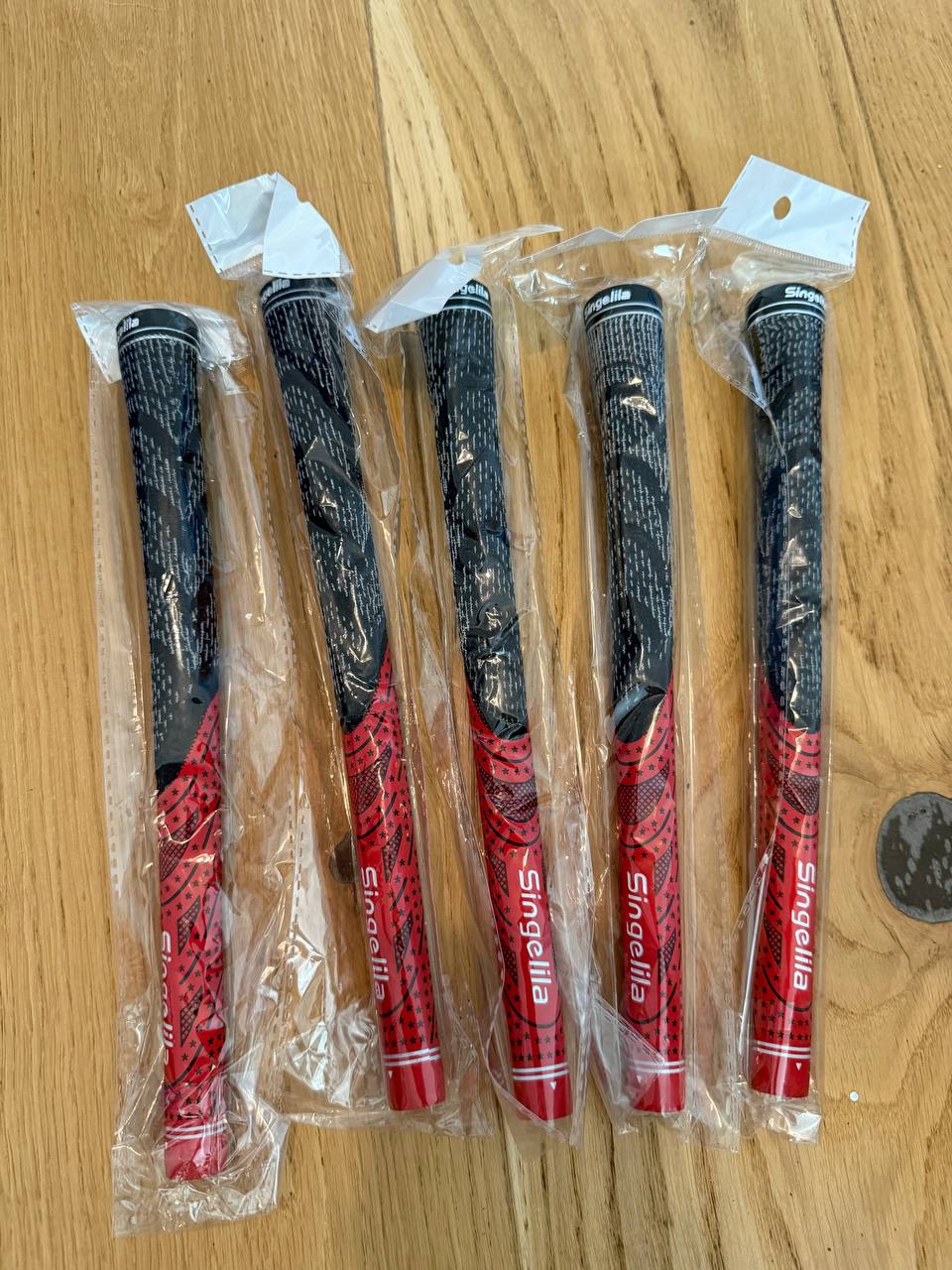 Singelila golfikepi gripid, 5 tk, uued